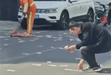 街头突现百元大钞！30万现金飘出后备箱：环卫工用扫帚扫钱-紫竹林-程序员中文网